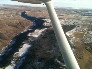 Enroute back to Springbank airport over Cochrane