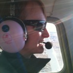 Flying with my pink ANR headset from Powder Puff Pilot.